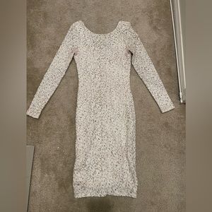 White with gold long sleeve dress. Bump friendly. Size small. Good condition